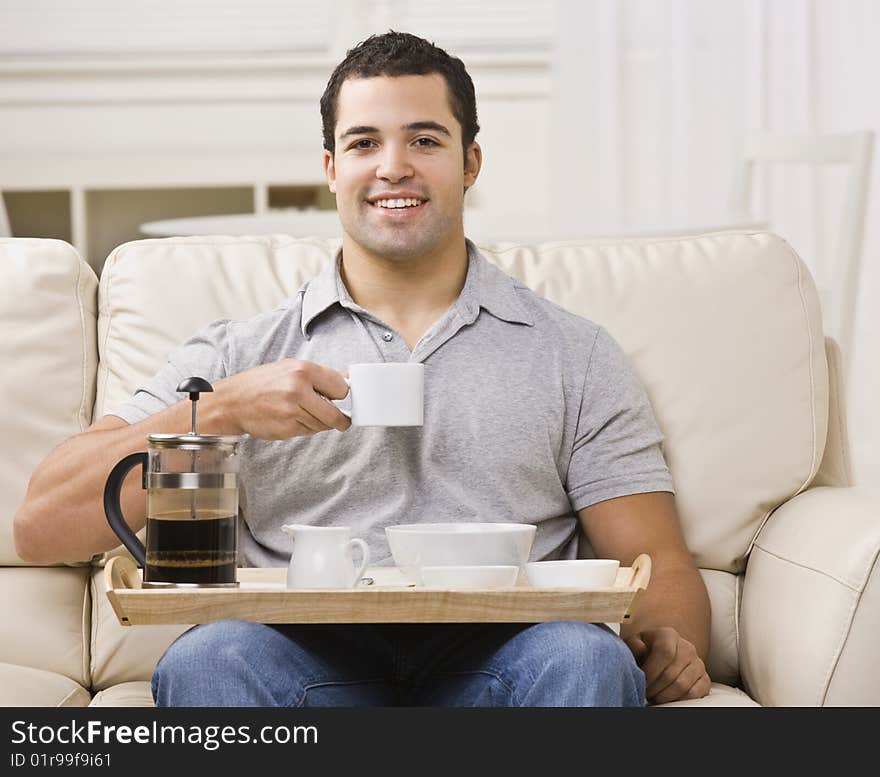 Man With Breakfast Tray And Coffee