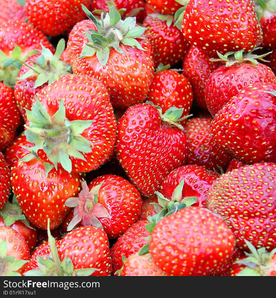 Fresh strawberries background. Colorful image