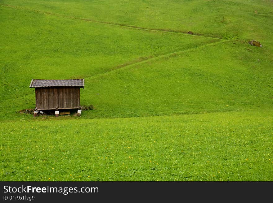 Old rural barn on Alps meadow. Old rural barn on Alps meadow