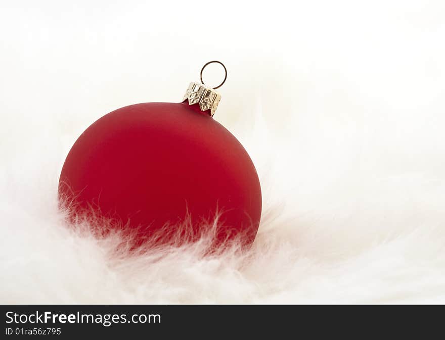 Red Christmas ball on white background. Red Christmas ball on white background