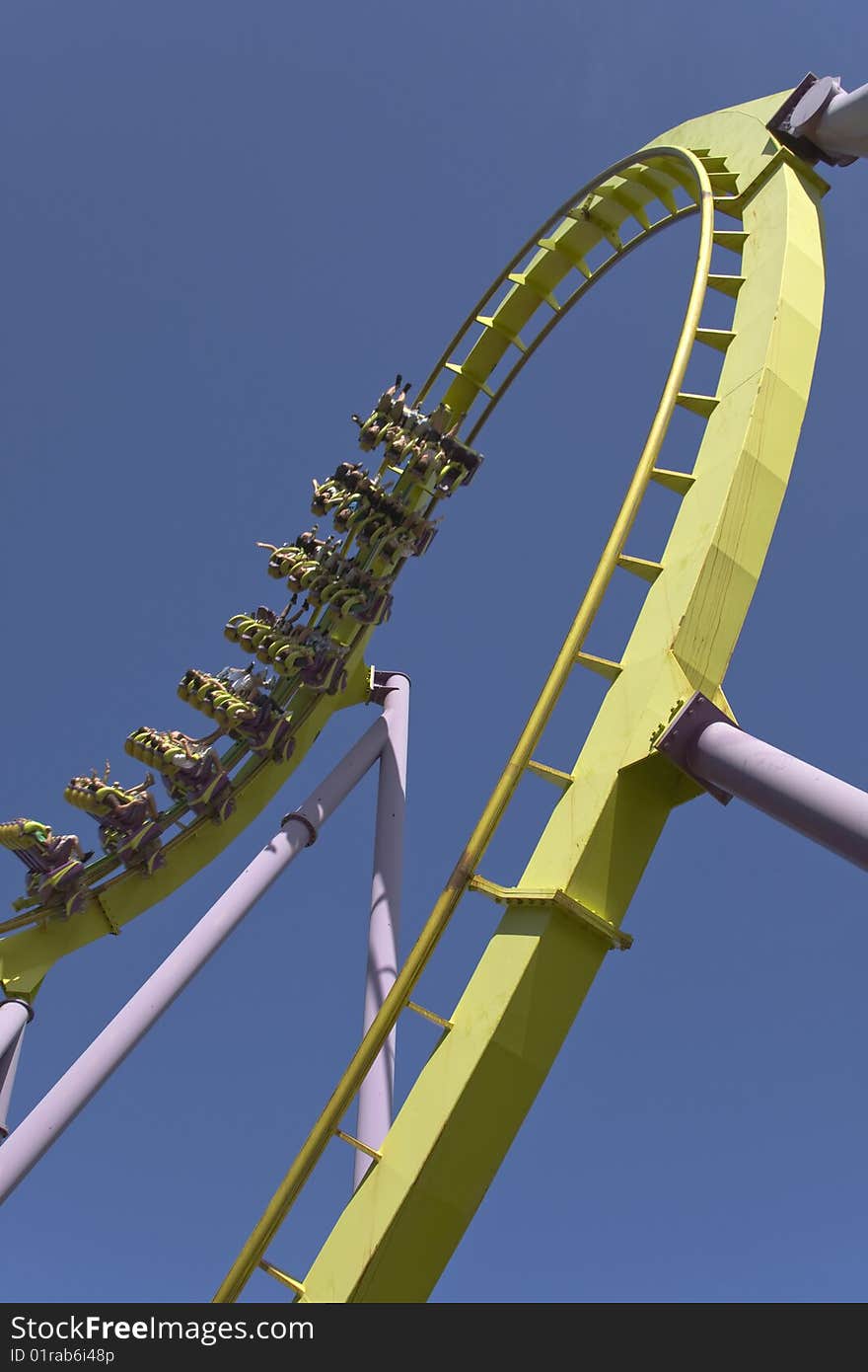 A group of people riding rollercoaster at amusement park,New Jersey.