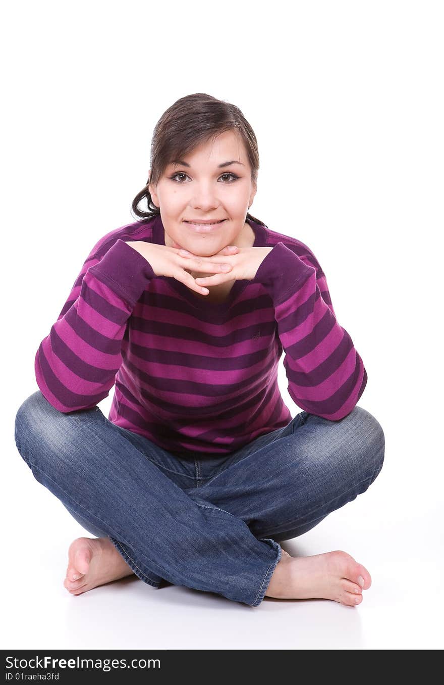 Young casual woman on white background