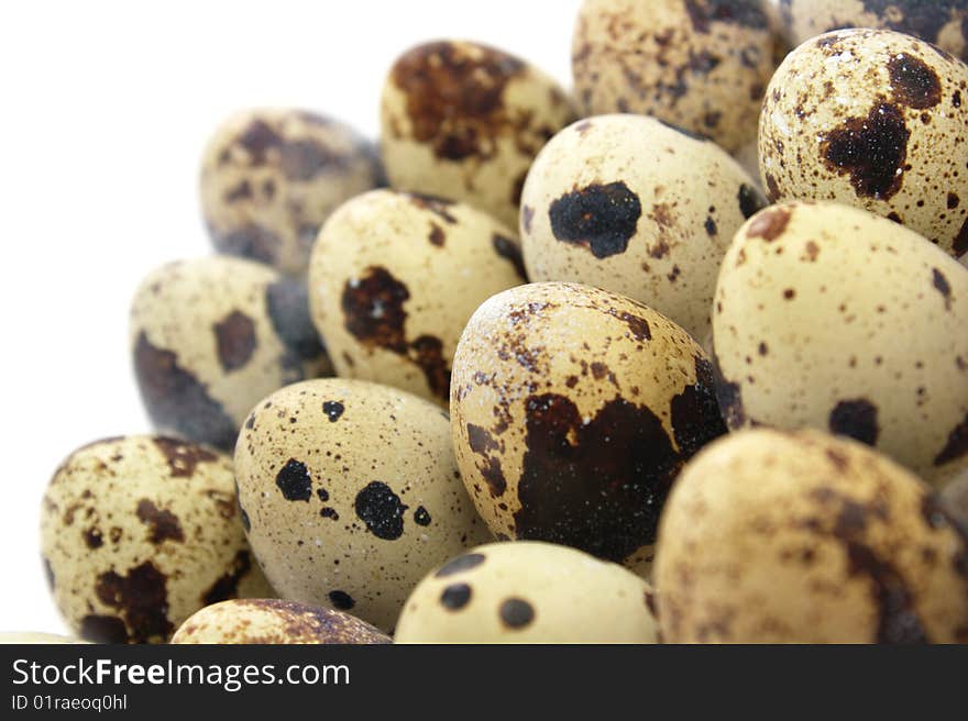 Original Quail Eggs on white