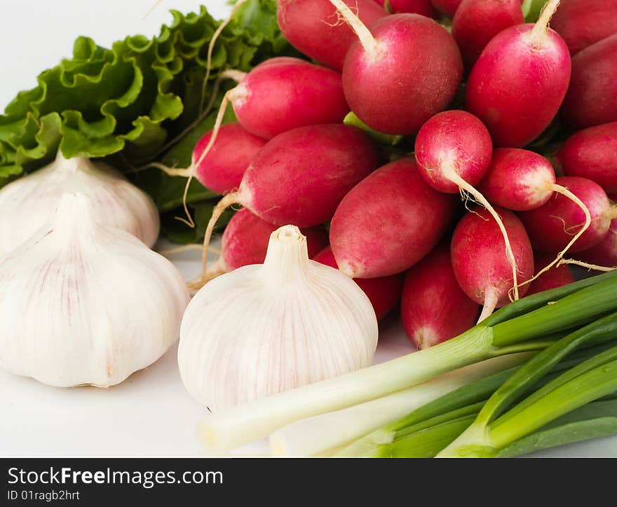 Spring onions, garlic, lettuce and radish