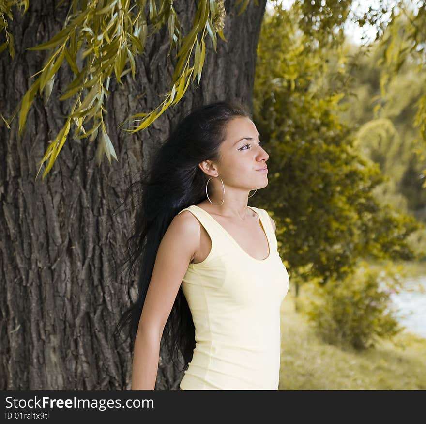 Beautiful girl looking far on a lake. Beautiful girl looking far on a lake