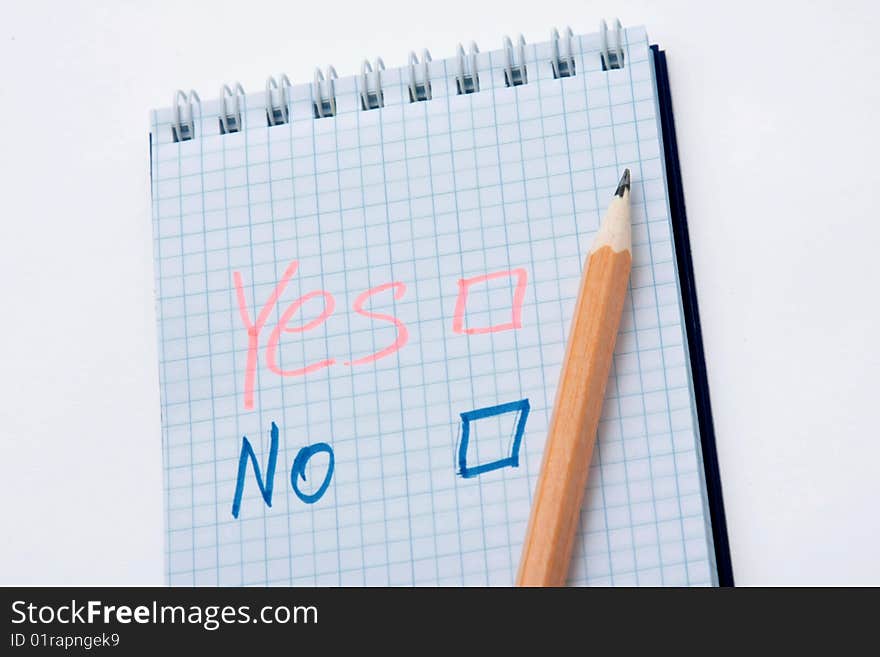 Black pen with note book isolated on white