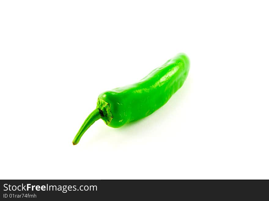 Single green chile with clipping path on a white background