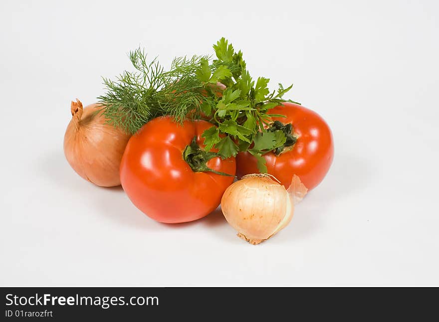 Tomatoes and onions on white background. Tomatoes and onions on white background.