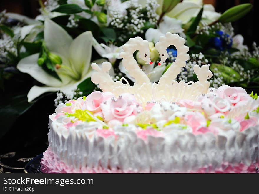 Wedding pie with figures of two swans.