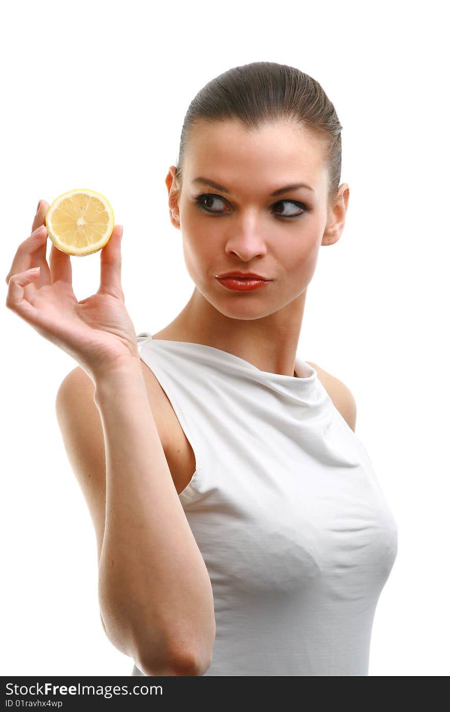 Young woman holding a lemon