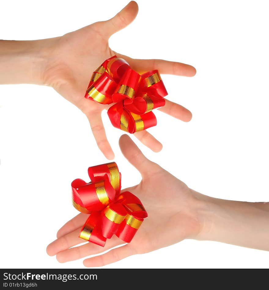 Hands with red bow isolated on white