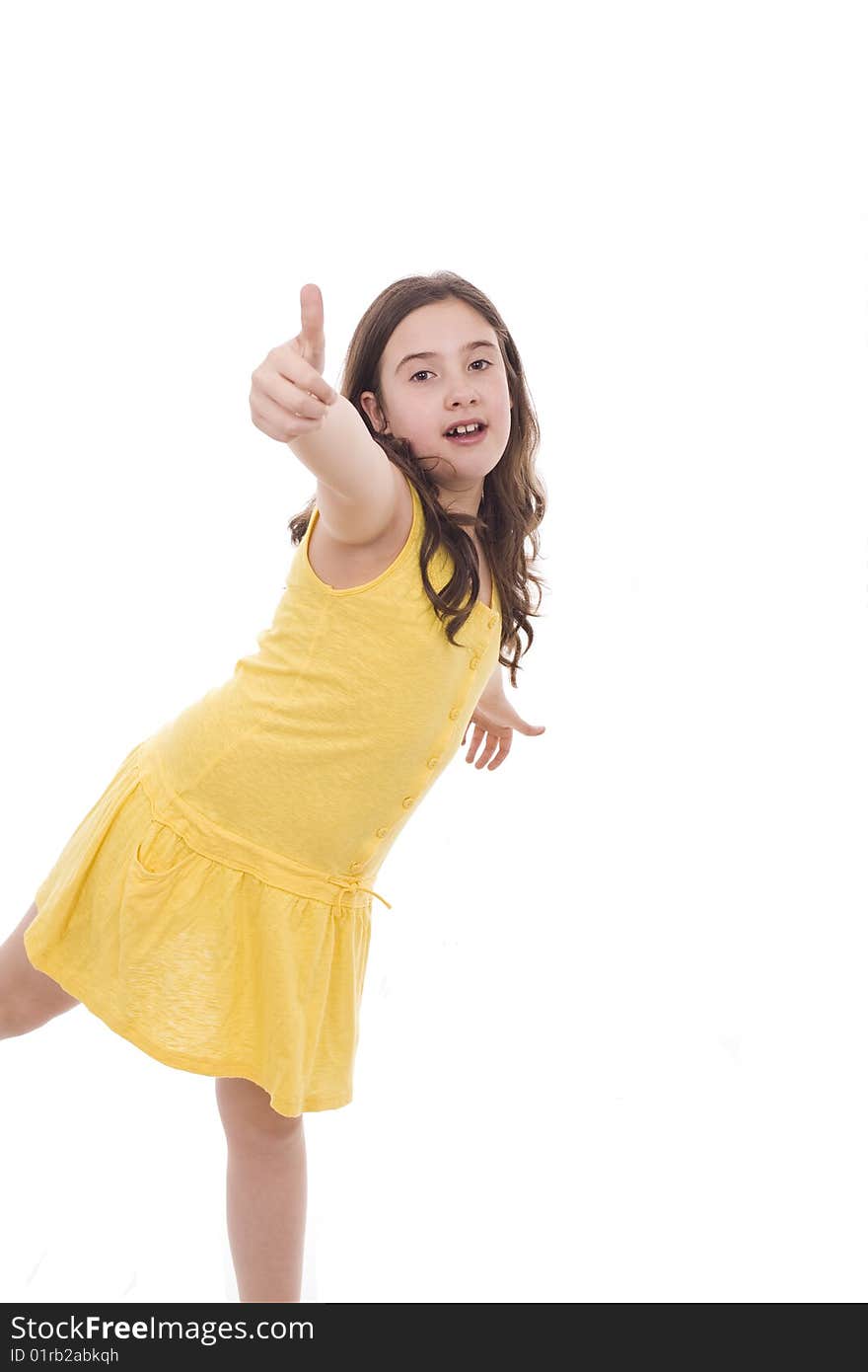 A young girl playing and making signs with her hand