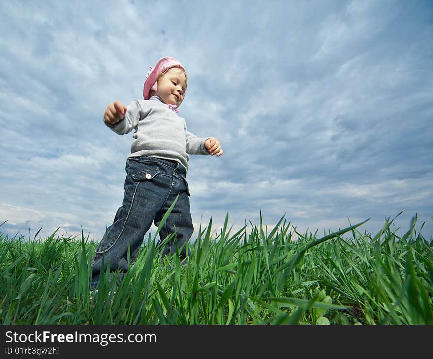 Little girl in field