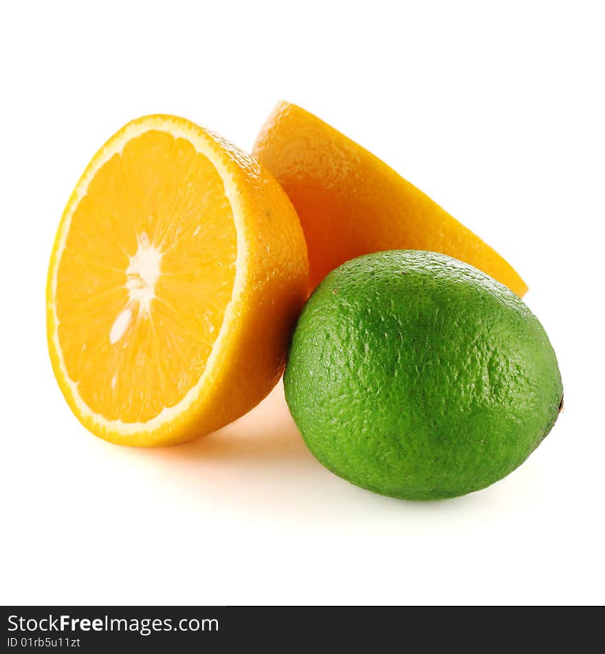 Tropical fruits orange and lime isolated on white