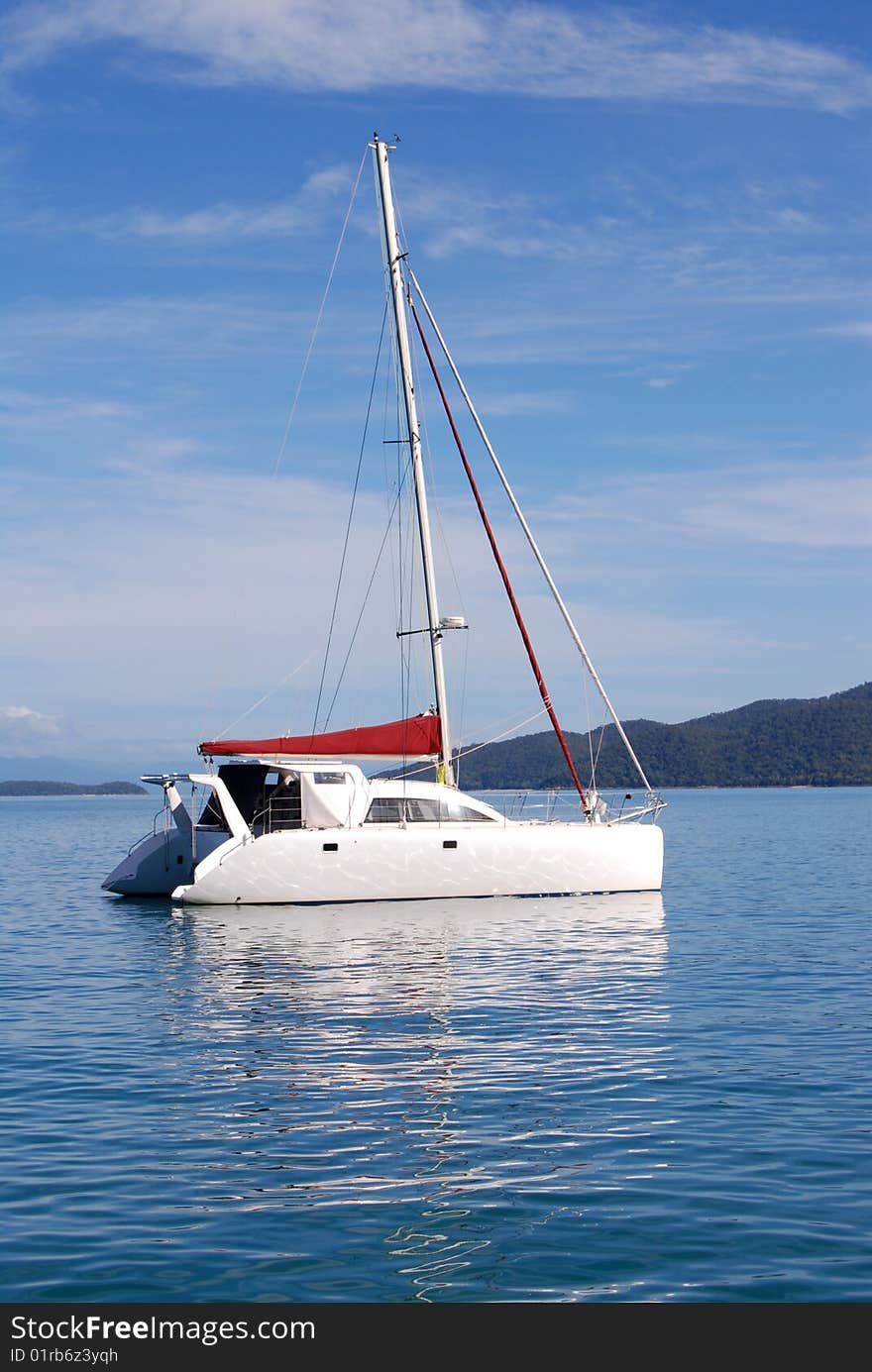 A yacht moored off the coast of Hinchinbrook Island in northern Queensland, Australia.