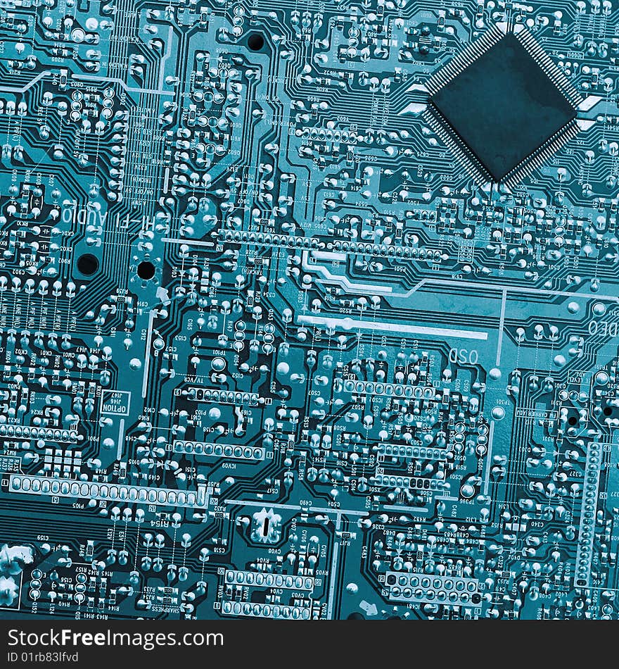 Electronic board with chip. Blue toned