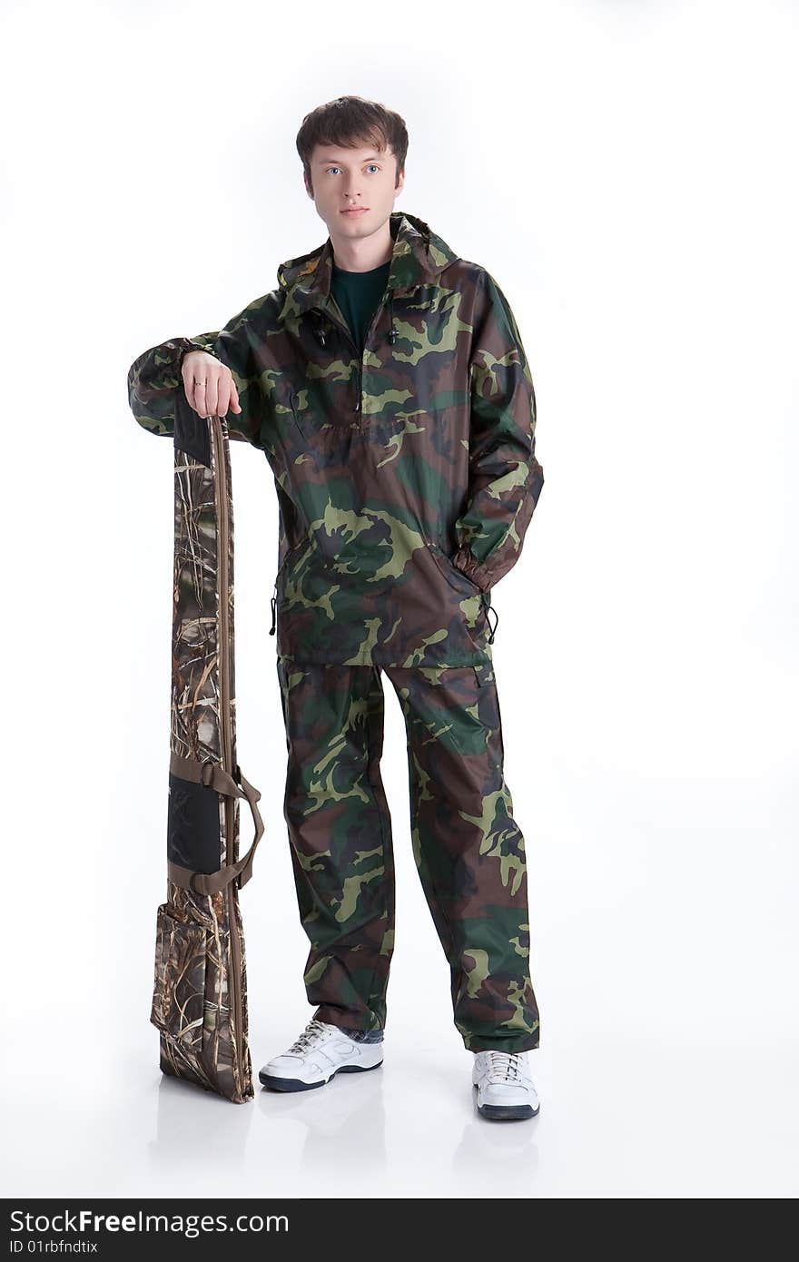 Young man in uniform on isolated background