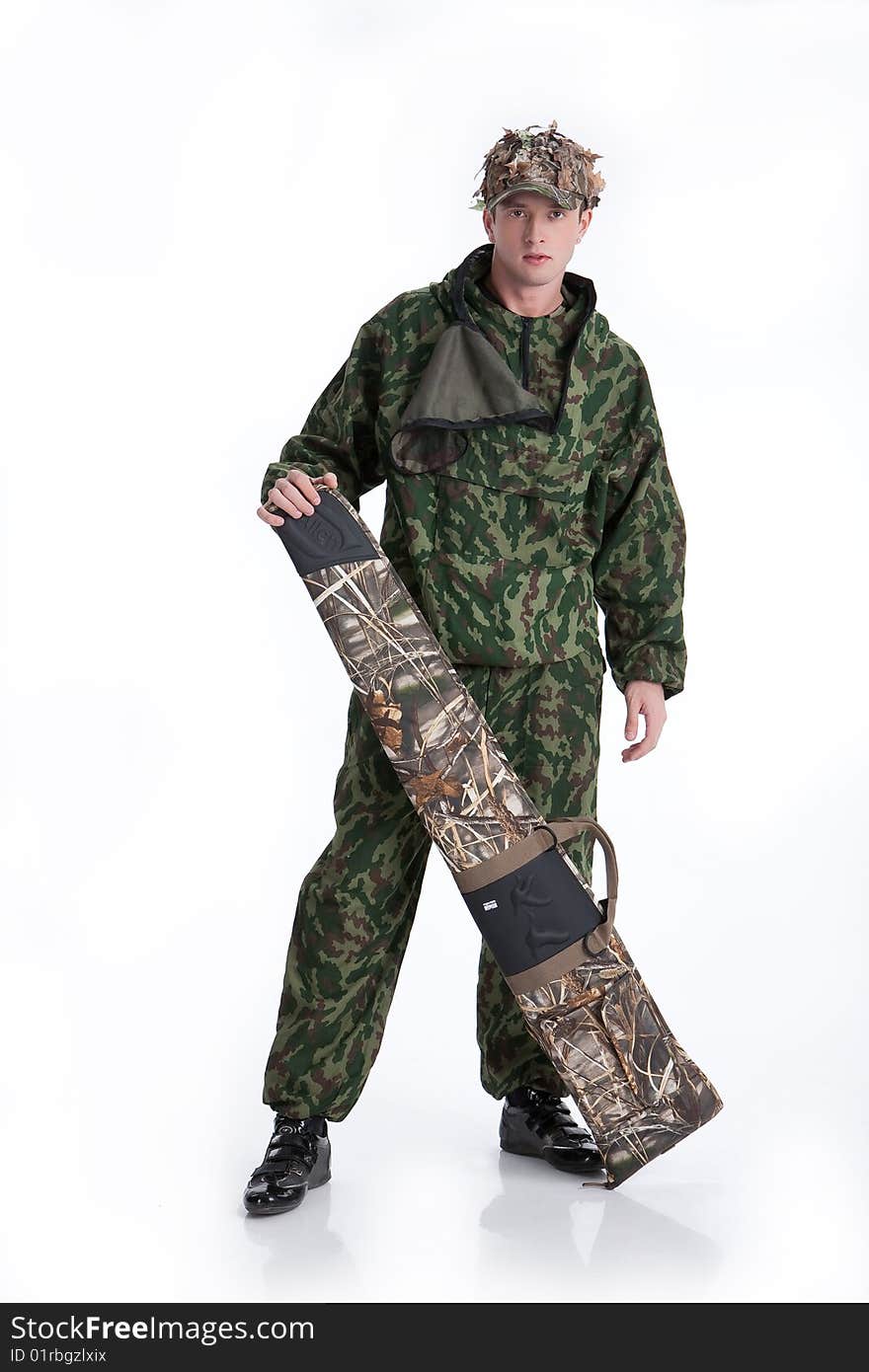 Young man in uniform on isolated background