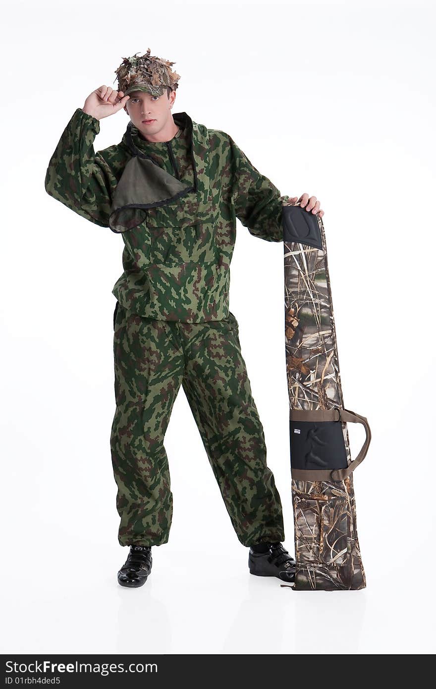 Young man in uniform on isolated background