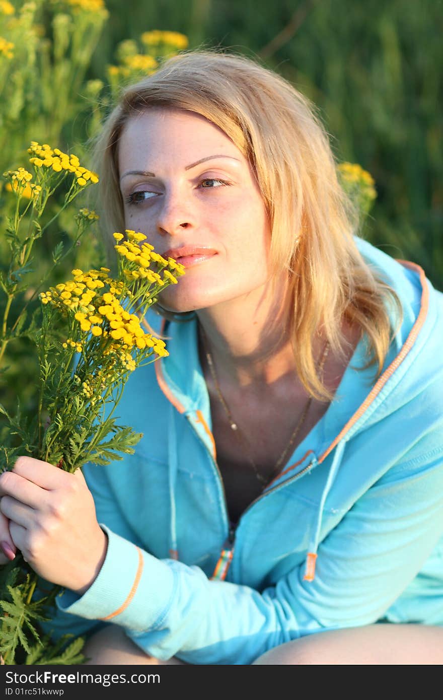 There are woman and wield flowers