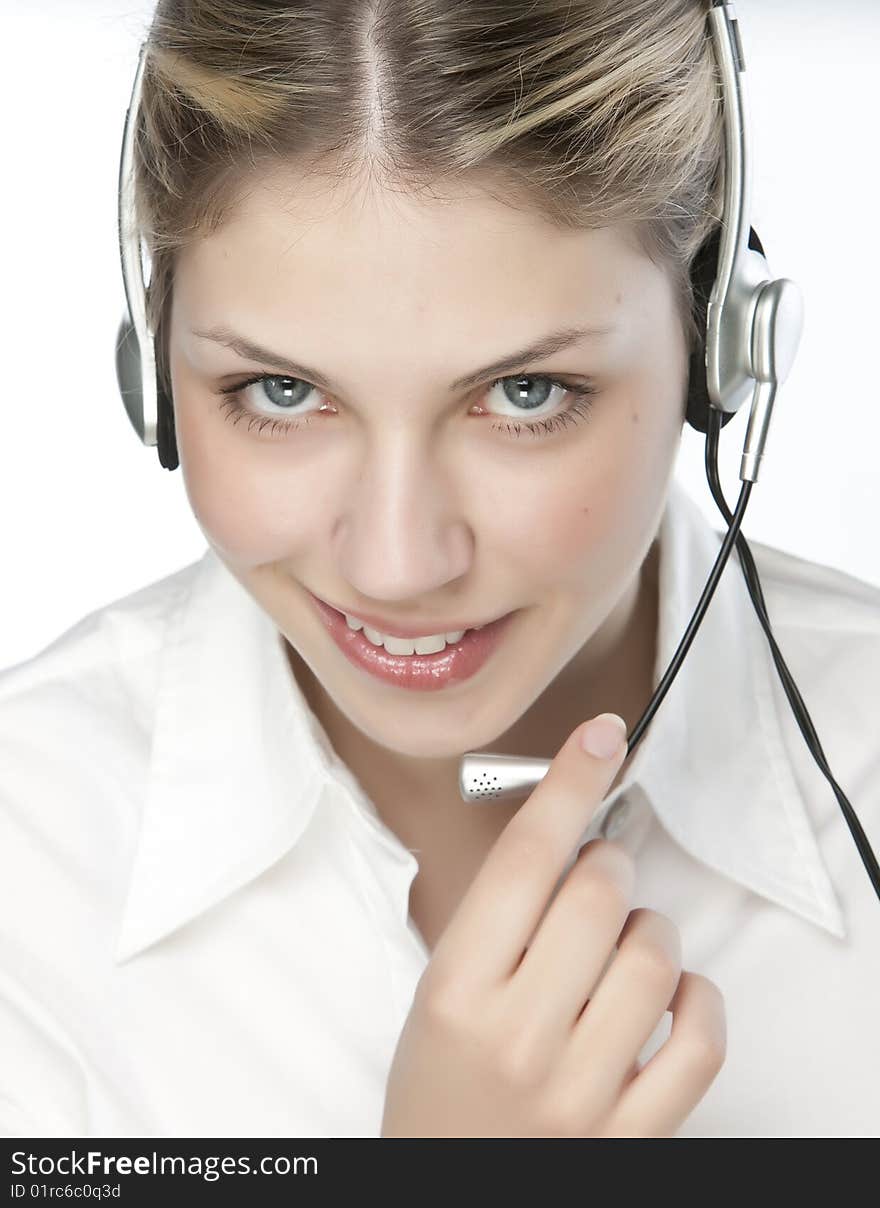 A friendly secretary/telephone operator in an office environment.