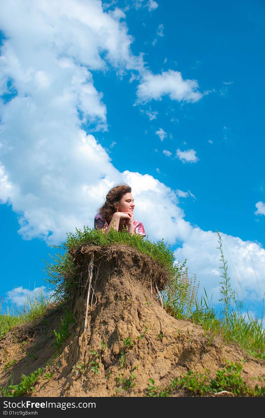 Smiling girl on a hill. Smiling girl on a hill