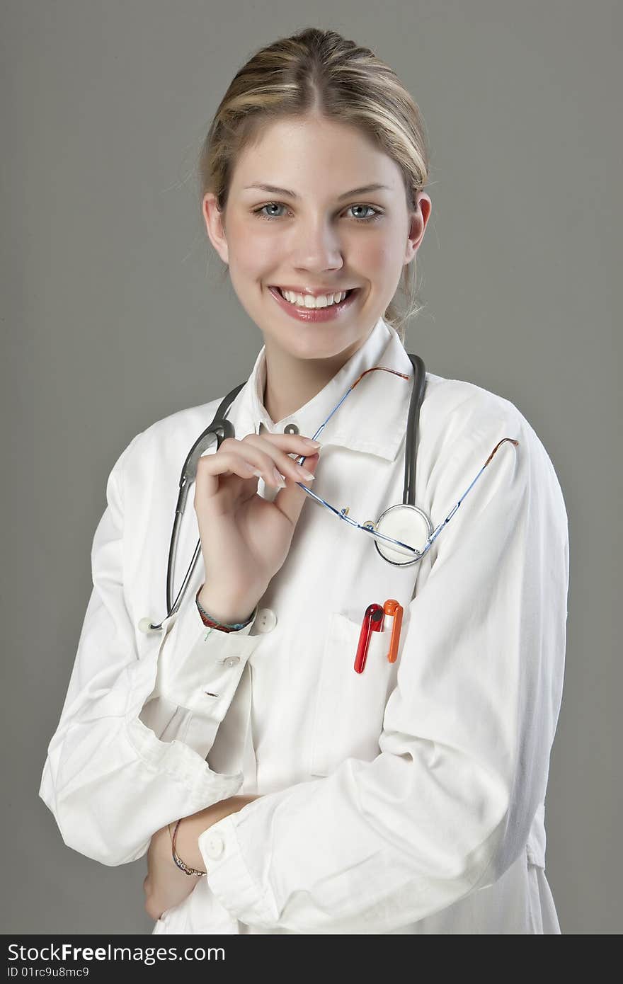 Beautiful young doctor with stethoscope