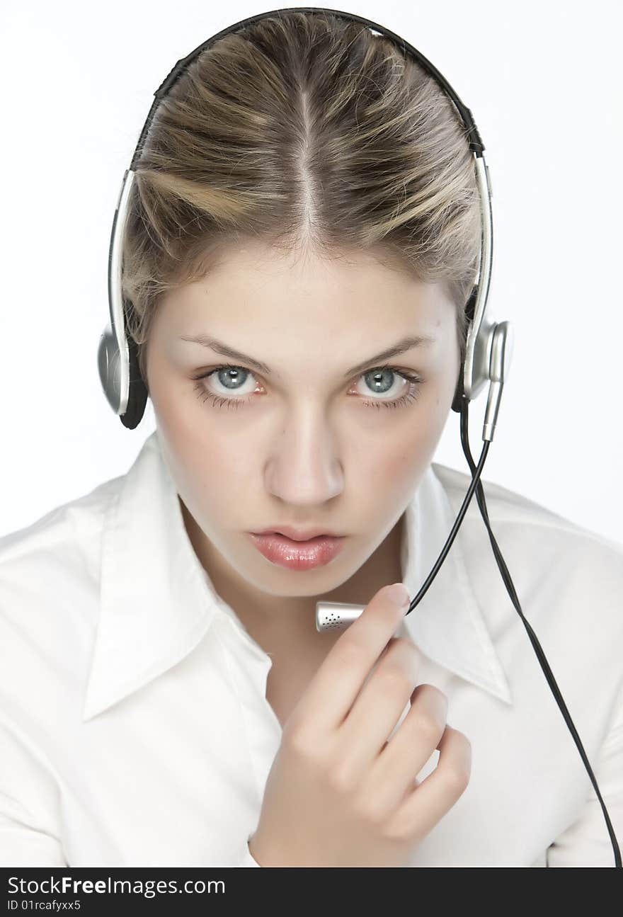 A friendly secretary/telephone operator in an office environment.