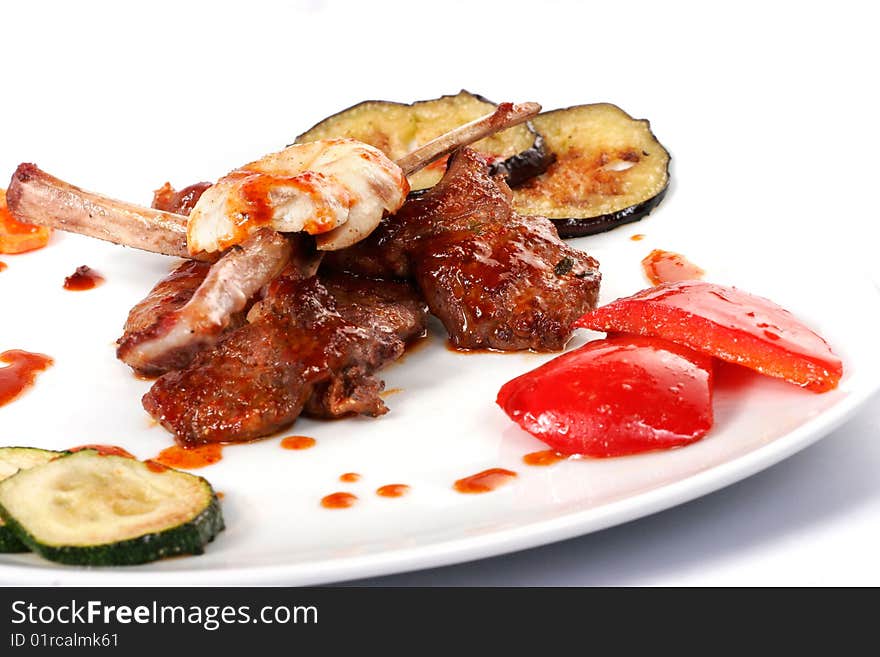 Bone lamb platter. Teppanyaki dish closeup