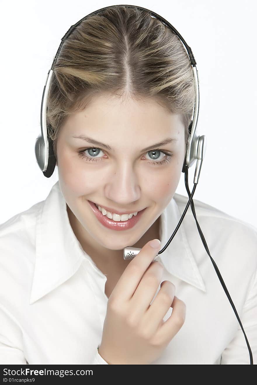 A friendly secretary/telephone operator in an office environment.