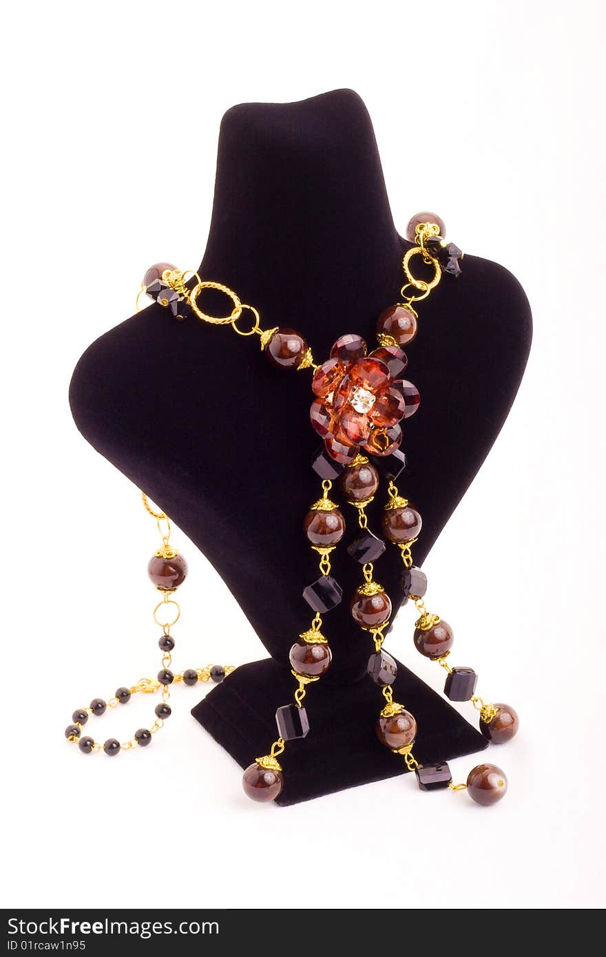 Elegant necklace on black mannequin stand