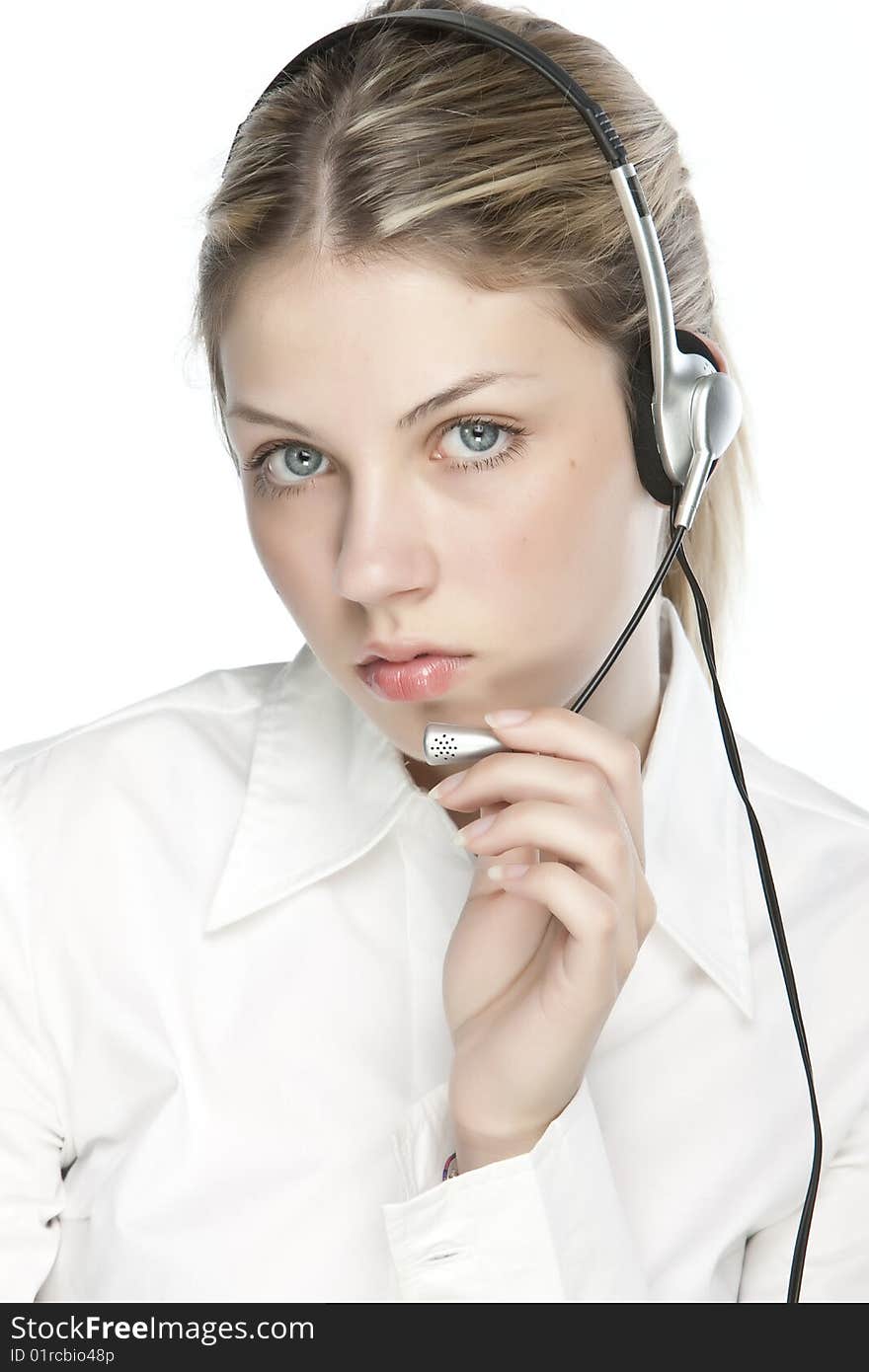 A friendly secretary/telephone operator in an office environment.