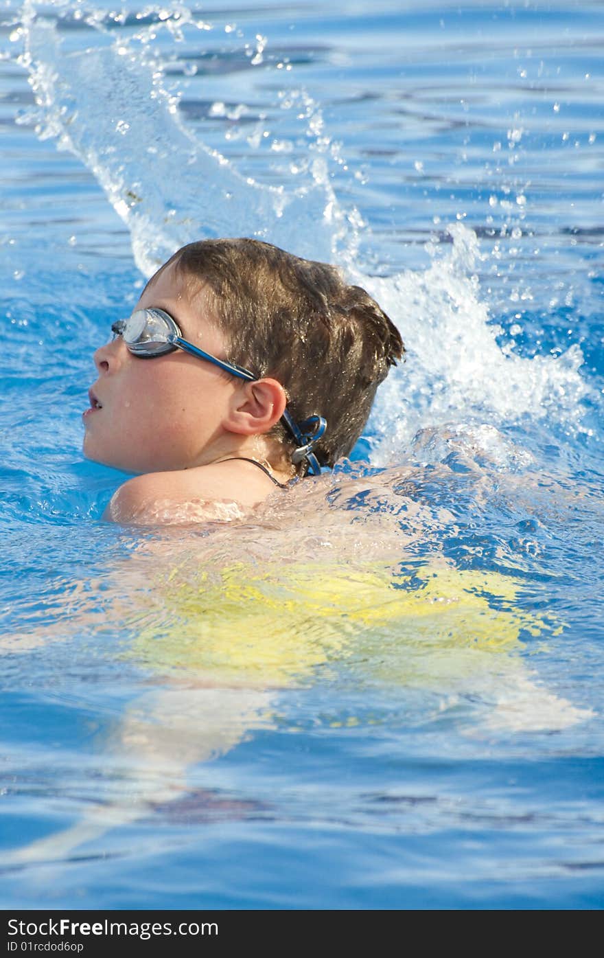 Picture of a boy on a swimming pool