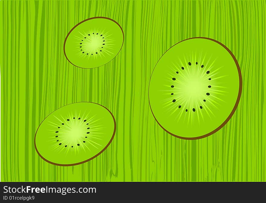 Three kiwi fruit on a green background in a strip