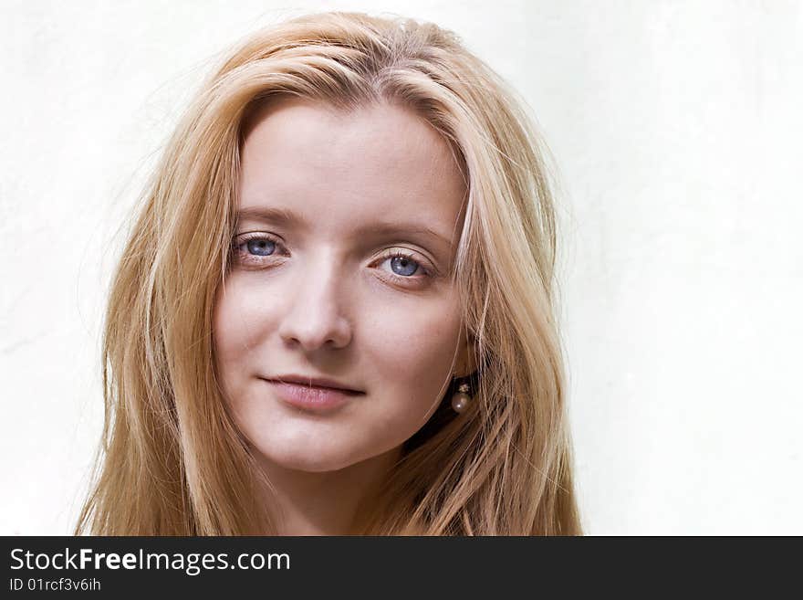 Portrait of a young girl in on white