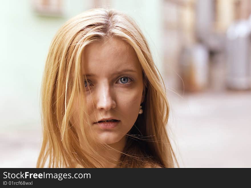 Portrait on young woman in the street