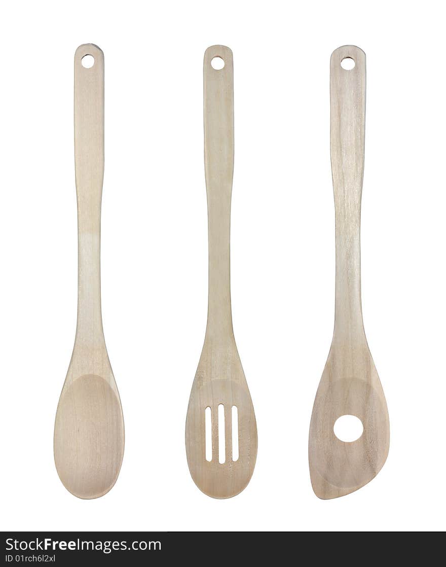 Three wooden kitchen spoons isolated on white. Three wooden kitchen spoons isolated on white