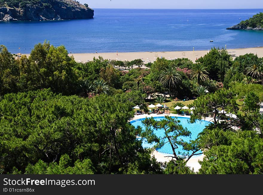 Coastline and pool of tropical resort. Coastline and pool of tropical resort