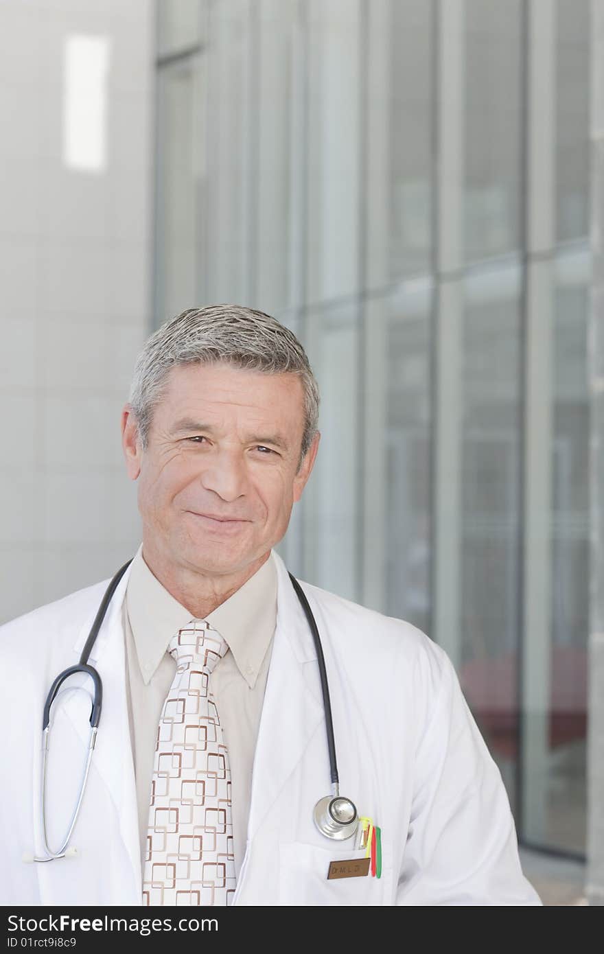 Close up of smiling male doctor. Close up of smiling male doctor