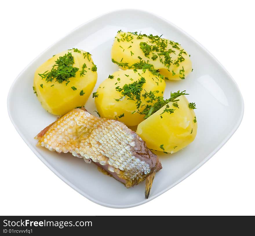 Plate of potato with fish isolated on white