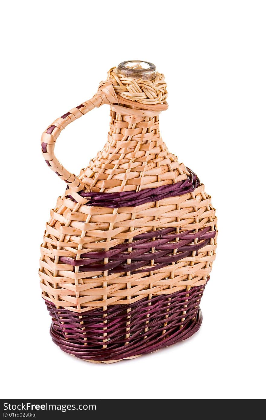 Wicker bottle on white background