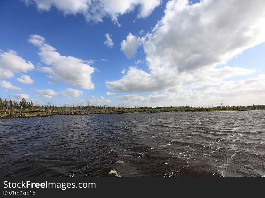 Quiet lake and blue sky