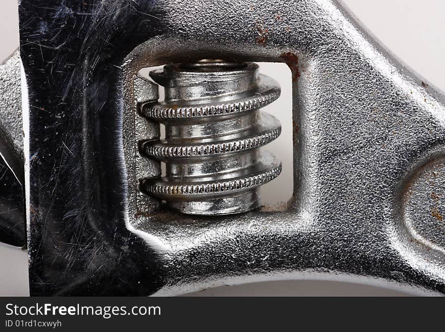 Macro closeup of the adjustment knob on a crescent wrench. Macro closeup of the adjustment knob on a crescent wrench