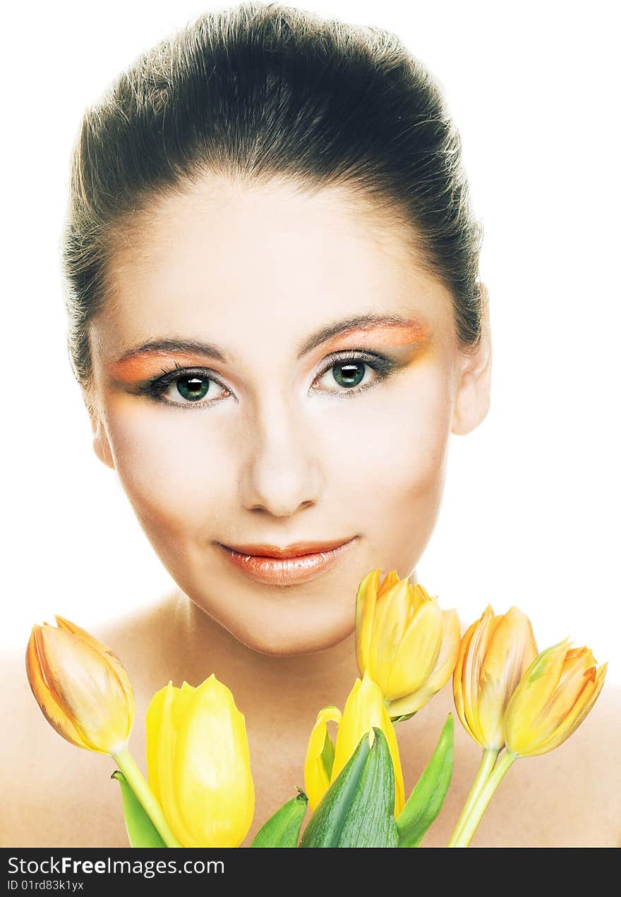 Portrait of young woman with yellow tulips. Portrait of young woman with yellow tulips