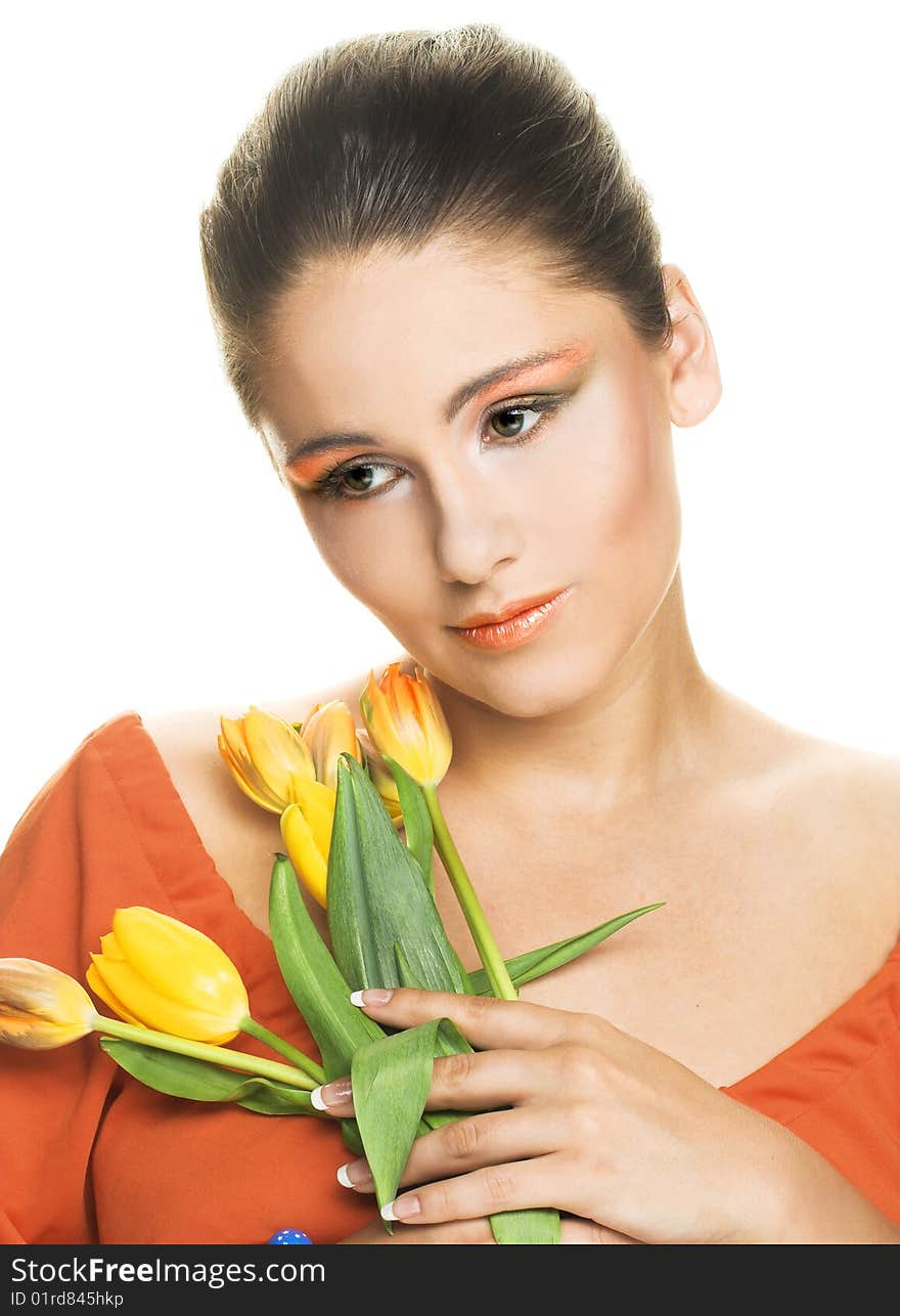 Portrait of young woman with yellow tulips. Portrait of young woman with yellow tulips