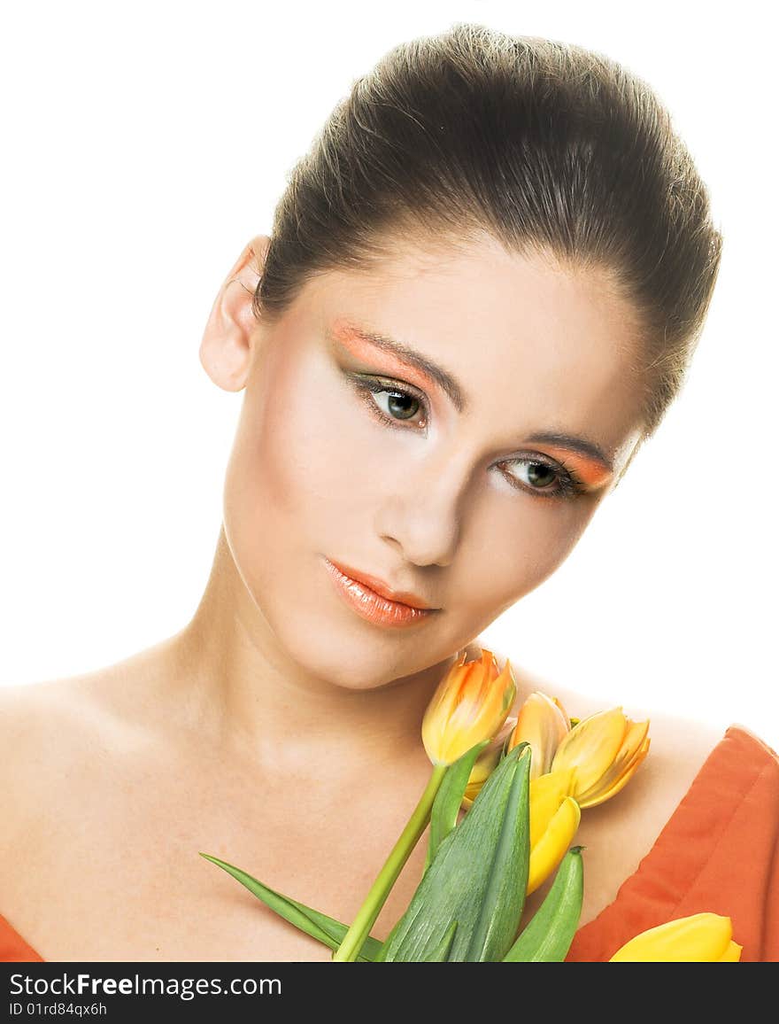 Portrait of young woman with yellow tulips. Portrait of young woman with yellow tulips