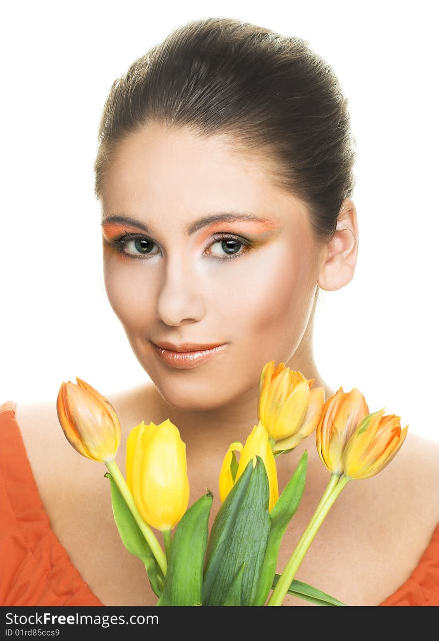 Portrait of young woman with yellow tulips. Portrait of young woman with yellow tulips