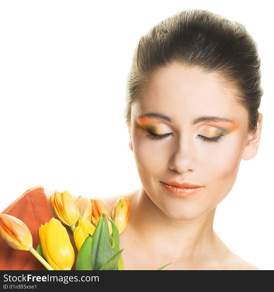 Portrait of young woman with yellow tulips. Portrait of young woman with yellow tulips