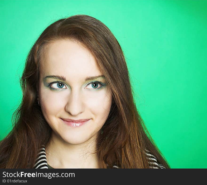 Portrait of student girl with copybooks in her hands.