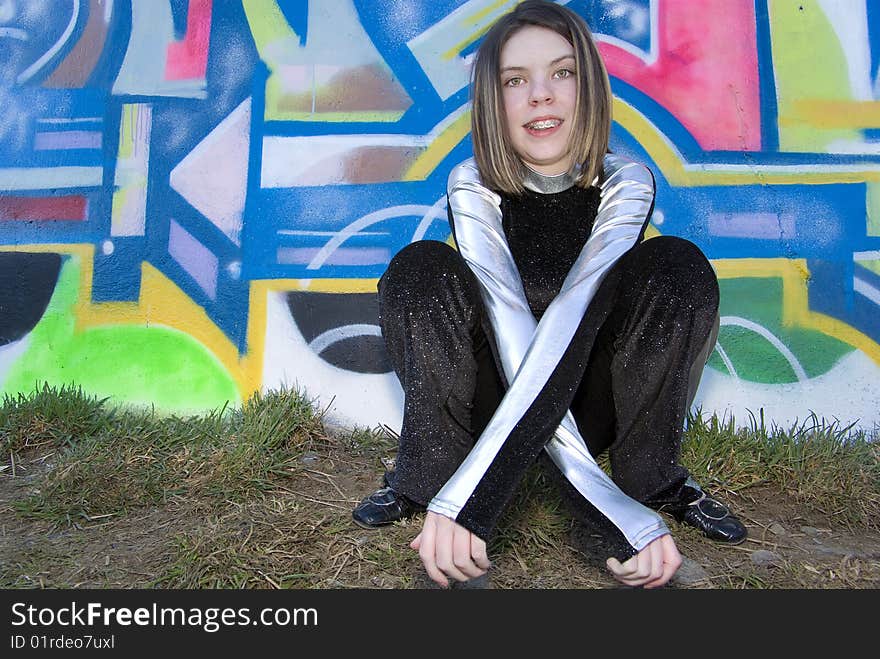 Gymnastic and dance teen girl doing a handstand in urban setting. Gymnastic and dance teen girl doing a handstand in urban setting